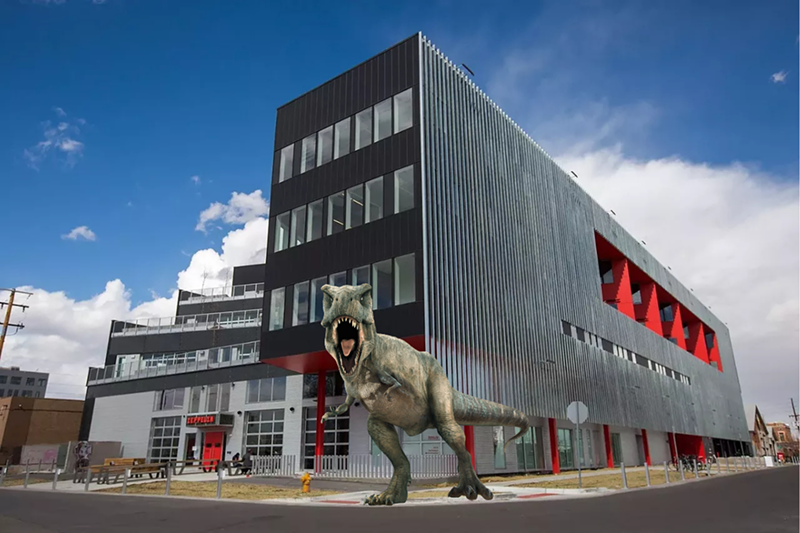 Image: dinosaur in front of a building